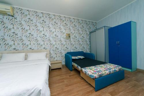 Ένα ή περισσότερα κρεβάτια σε δωμάτιο στο Luxury Apartaments з видом на озеро