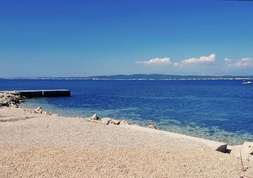 a view of a large body of water at OrkulaBliss Apartments in Pašman