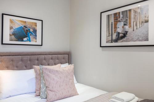 Кровать или кровати в номере Urban Chic - Covent Garden