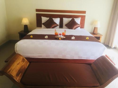 Una cama o camas en una habitación de The Tinsi
