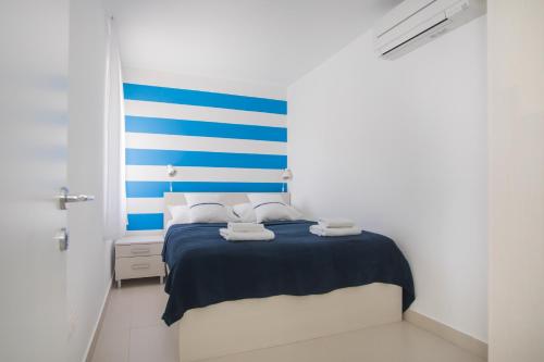 A bed or beds in a room at blue adria