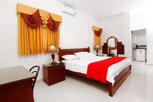 Katil atau katil-katil dalam bilik di Hotel Versailles Internacional