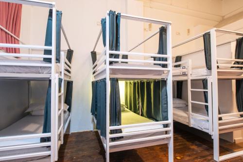 a row of bunk beds sitting next to each other at Safestay Barcelona Gothic in Barcelona