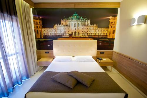 Llit o llits en una habitació de Best Western Hotel Luxor