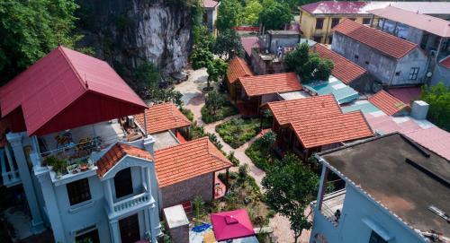 an overhead view of a group of houses with red roofs at Ruby Homestay in Ninh Binh