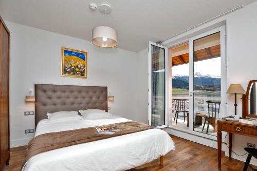 Ένα ή περισσότερα κρεβάτια σε δωμάτιο στο RESIDENCE LE SPLENDID