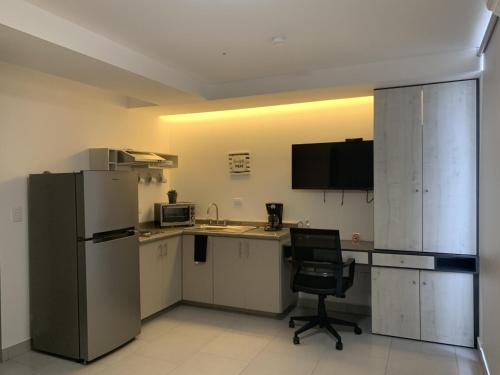 Köök või kööginurk majutusasutuses Suites André Confort Ejecutivo
