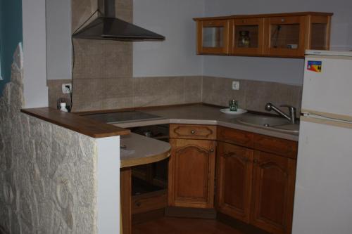 Кухня або міні-кухня у Apartament Sosnowy