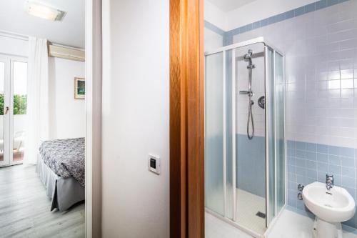 Koupelna v ubytování Hotel Ambassador Meuble