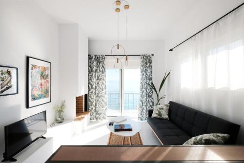 O zonă de relaxare la ZEN Minimal Luxury Housing Tyros
