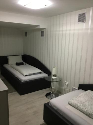 Ένα ή περισσότερα κρεβάτια σε δωμάτιο στο Varkerulet Apartman