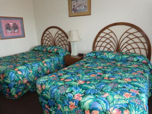 Postel nebo postele na pokoji v ubytování Fountain Motel