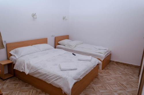 Postel nebo postele na pokoji v ubytování Casa Rezidentiala Pasteur