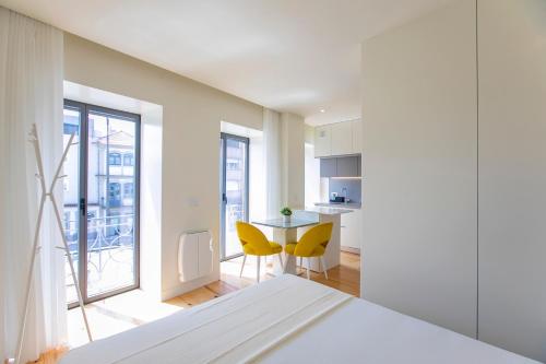 En eller flere senge i et værelse på Casa São Lázaro