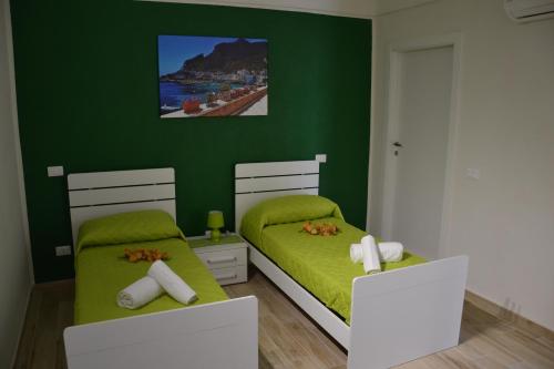 En eller flere senge i et værelse på B&B Stella Maris Trapani Centro