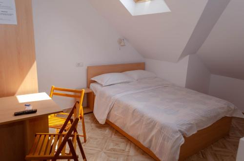 Postel nebo postele na pokoji v ubytování Casa Rezidentiala Pasteur
