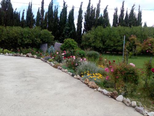 Jardín al aire libre en Le Rose