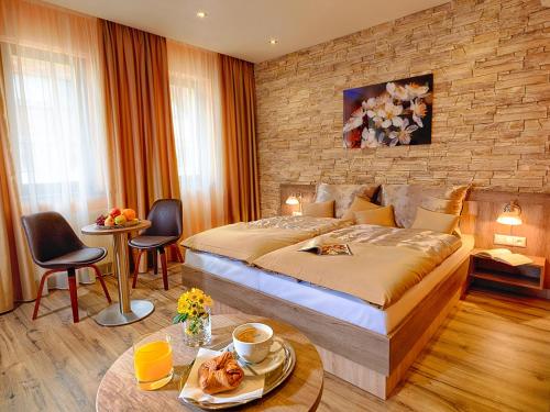 Voodi või voodid majutusasutuse Hotel Viktor toas