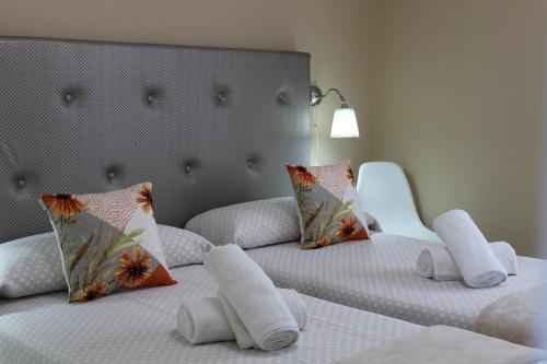 Ένα ή περισσότερα κρεβάτια σε δωμάτιο στο HolidaynorthTenerife Exotic Apartament