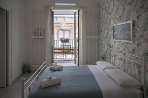 Llit o llits en una habitació de Ai Mori