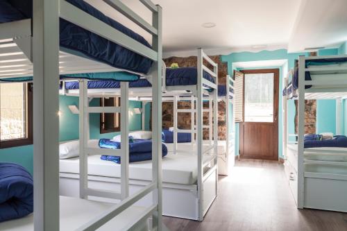 מיטה או מיטות קומותיים בחדר ב-Villa Palatina