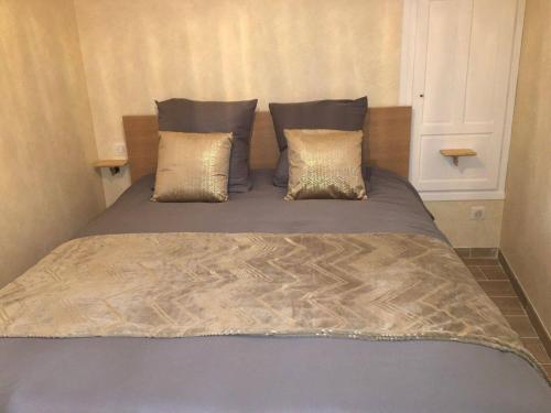 Кровать или кровати в номере Chez Maufoux - Centre - Hospices - Climatisation