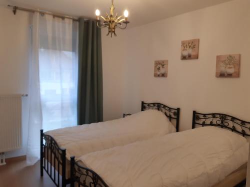 Posteľ alebo postele v izbe v ubytovaní Le Carré Confidentiel