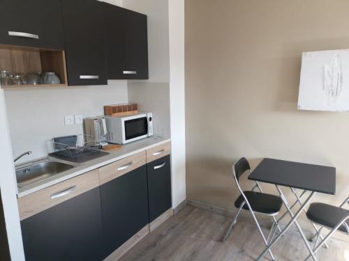 Dapur atau dapur kecil di Home Place Apartments - Langon Sauternes