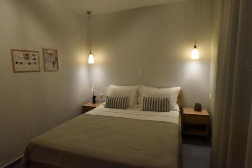 Ένα ή περισσότερα κρεβάτια σε δωμάτιο στο Neki's Apartments