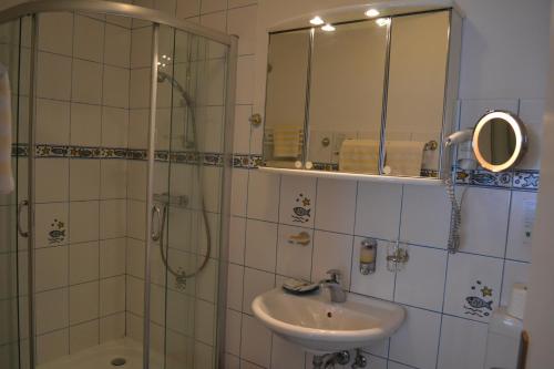 Koupelna v ubytování Hotel Hansa