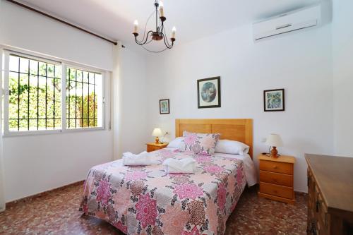Postel nebo postele na pokoji v ubytování Villa el Romeral SpainSunRentals 1112