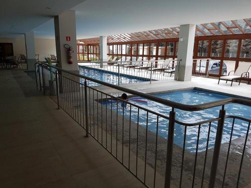 Πισίνα στο ή κοντά στο Apart Vista Azul - hospedagem nas montanhas