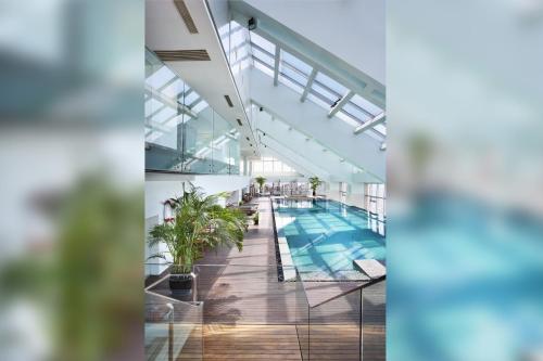 a view of a pool in a building at The Longemont Shanghai in Shanghai
