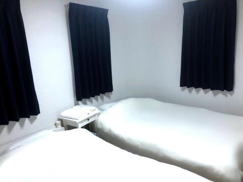 Ένα ή περισσότερα κρεβάτια σε δωμάτιο στο Thalassa Beach and Pool Villa