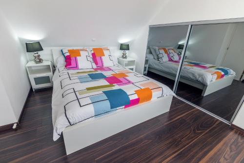 En eller flere senge i et værelse på gite Brest Au Bout Du Ponton