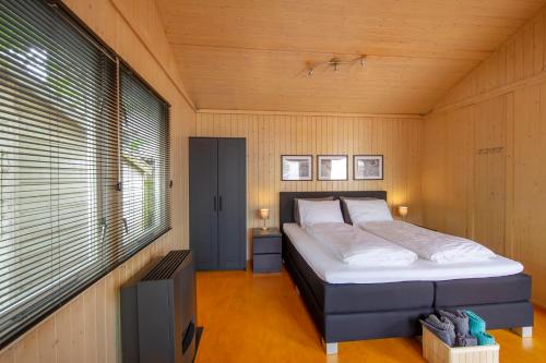 Ένα ή περισσότερα κρεβάτια σε δωμάτιο στο Centre beach lodge