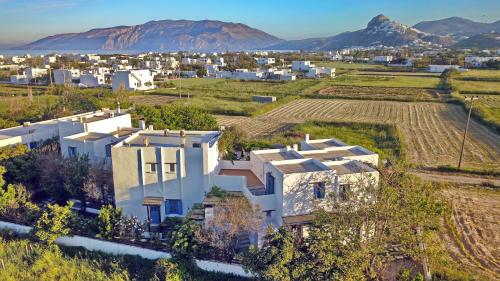an aerial view of a house with mountains in the background at Patriko in Skiros