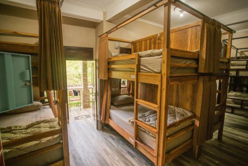 Postel nebo postele na pokoji v ubytování WW Backpackers