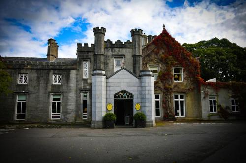 an old stone building with at Abbey Hotel Roscommon in Roscommon