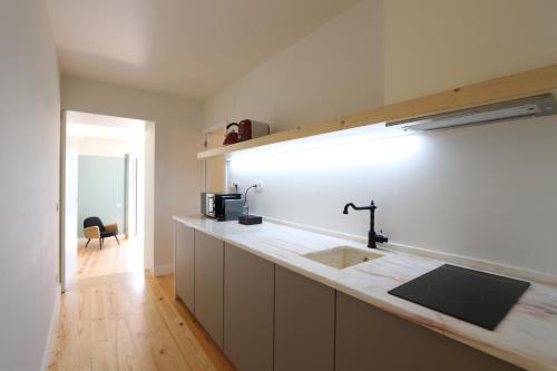 Kuchyň nebo kuchyňský kout v ubytování Light Blue Apartments - Downtown Lisbon