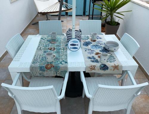 Casa Bianca & BLU a due passi dal mare tesisinde bir restoran veya yemek mekanı