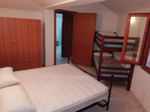 Cama o camas de una habitación en Seguimi a Calasetta
