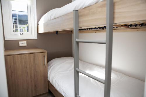 Postel nebo postele na pokoji v ubytování 6 pers. Veluwelodge XL met Sauna