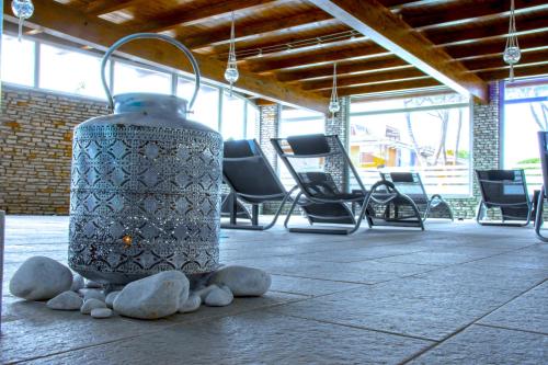 a large metal object sitting on top of a cement floor at Albergo Mediterraneo in Terracina