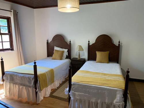 Ένα ή περισσότερα κρεβάτια σε δωμάτιο στο Quinta Santa Isabel