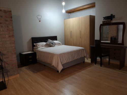 Katil atau katil-katil dalam bilik di TwinnPalms Accommodation