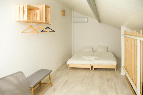 Postel nebo postele na pokoji v ubytování Casa das Pipas #2