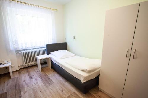 Postel nebo postele na pokoji v ubytování Hotel Restaurant Sennerbad