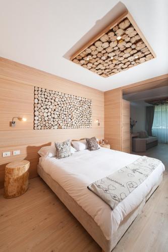 Postel nebo postele na pokoji v ubytování Hotel Dahu