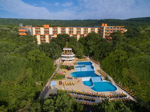 an aerial view of a resort with several pools at Hotel Sunrise Golden Sands in Golden Sands